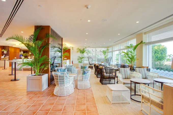 Caffè Cino interior with ocean-view seating