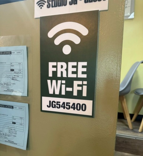 Wi-Fi password signage near order counter at Studio JG