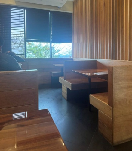 Infusion Tumon interior view with compact solo seating