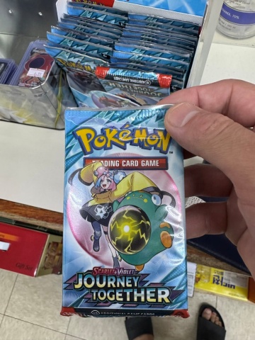 Pokémon booster packs available at Olympia Market.