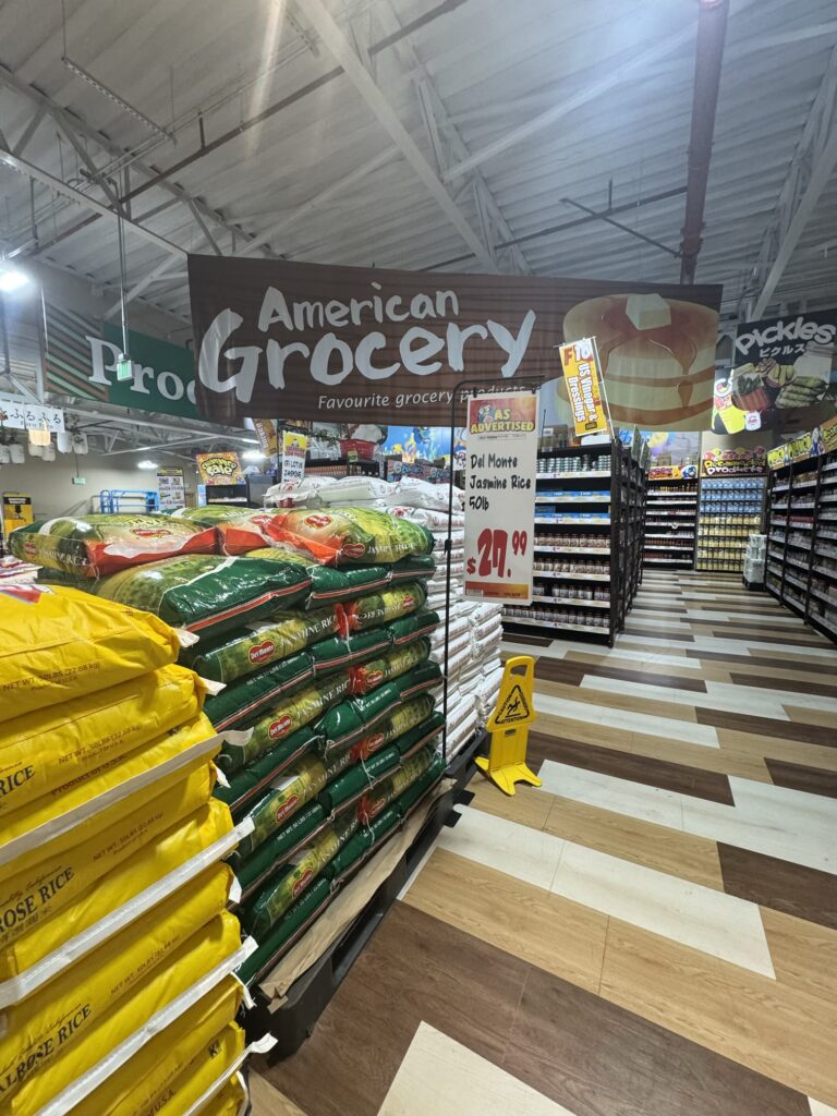 A lot of rice sacks are piled up.