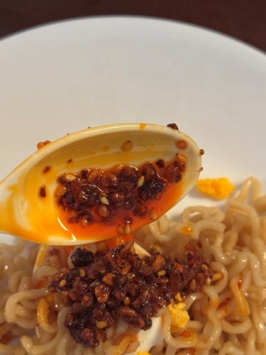 Close-up of crunchy garlic bits in Donki chili oil